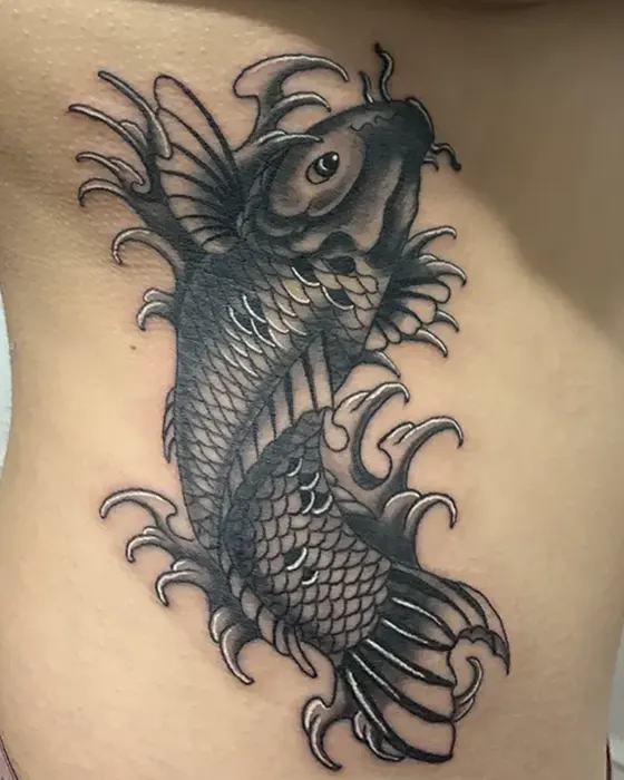 black and grey koi fish tattoo