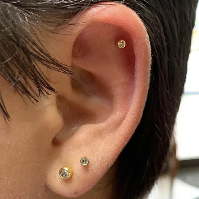 cartilage flat piercing earlobe piercing