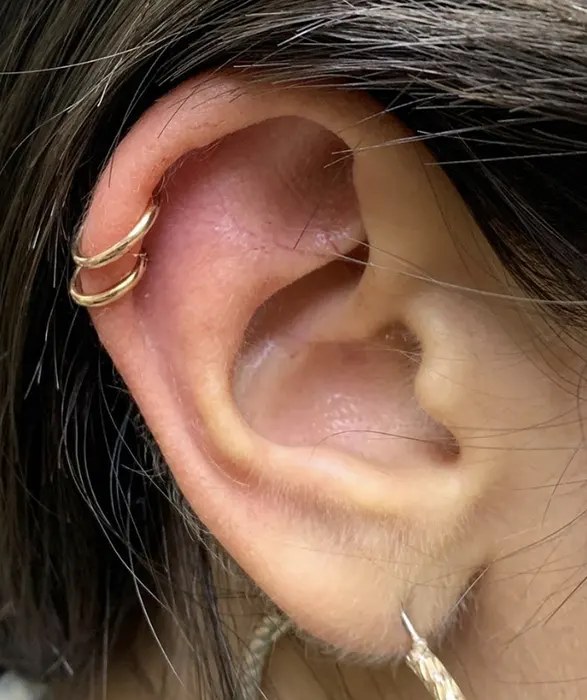 double cartilage hoop piercing