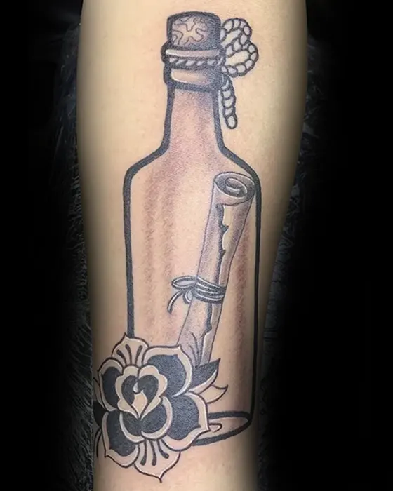 traditional bottle and rose tattoo